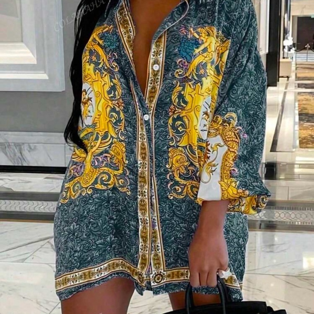 Women’s oversize top- NEW and IN THE PACKAGE!!